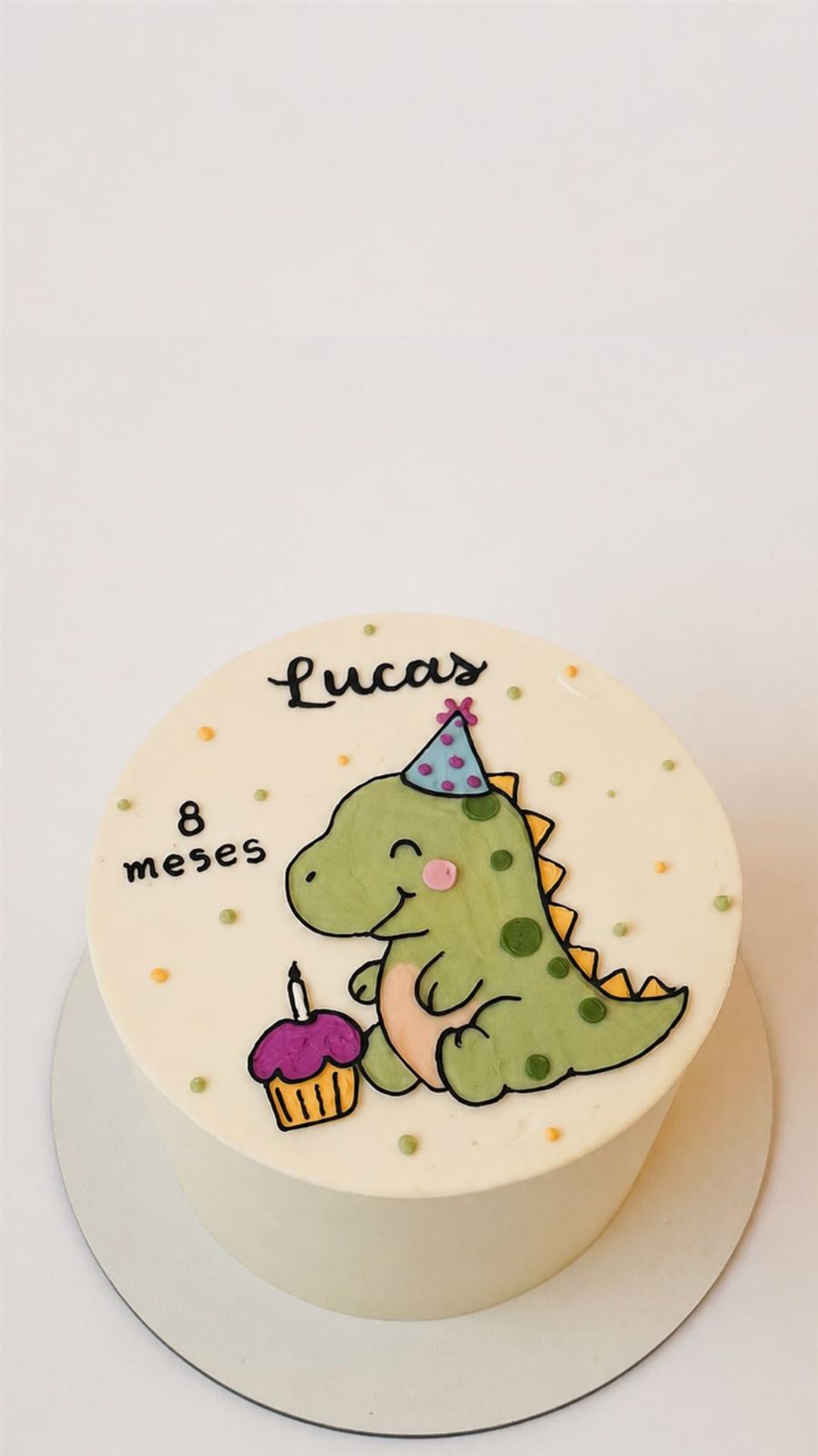 Bolo de mesversário de 8 meses branco com dinossauro pintado